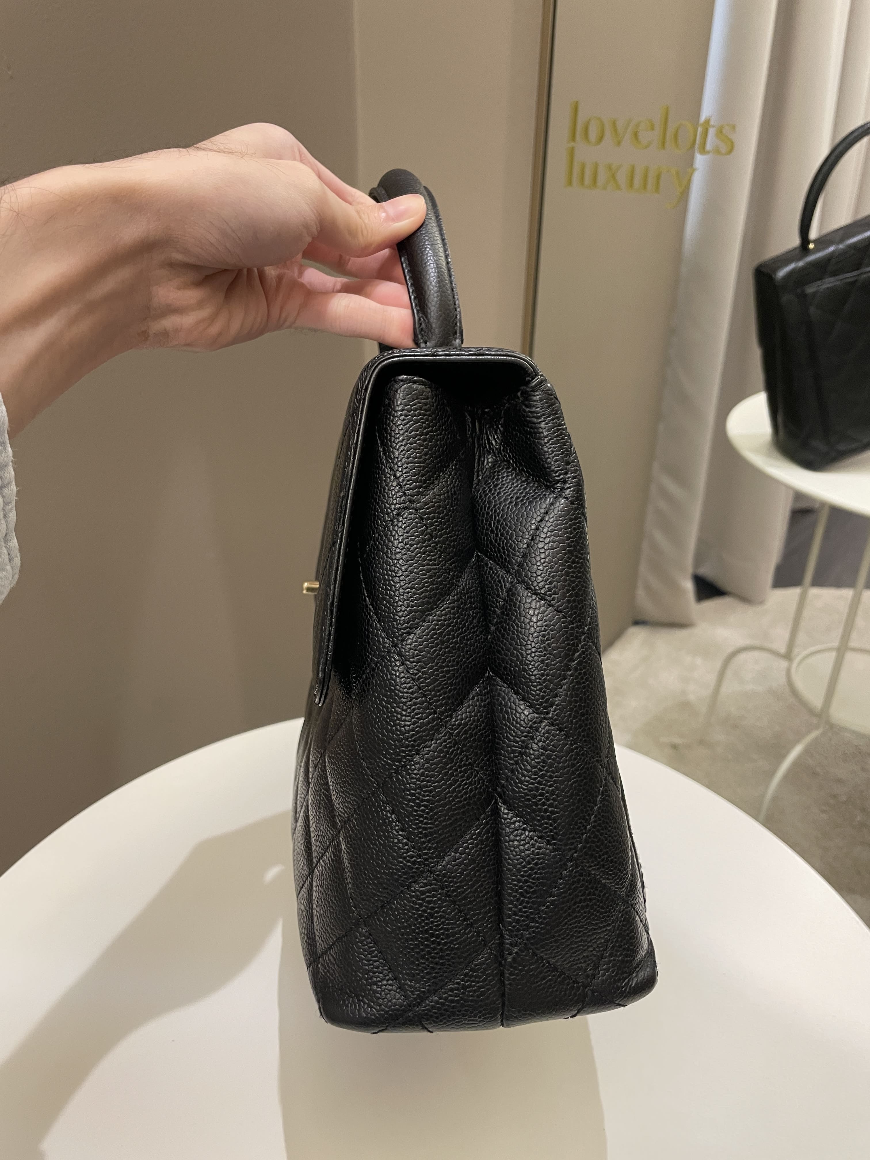 Chanel Kelly Quilted Top Handle Flap Black Caviar