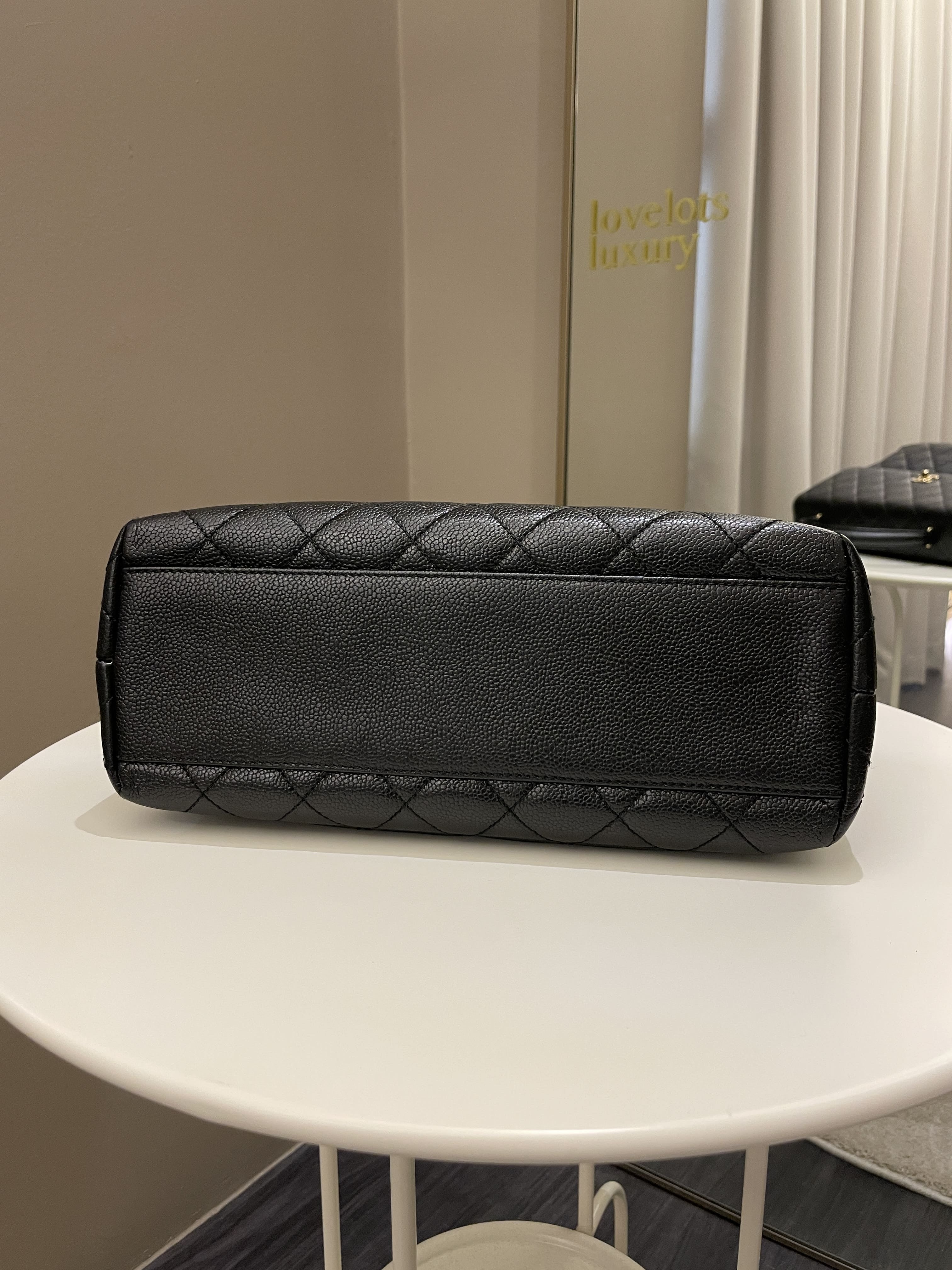 Chanel Kelly Quilted Top Handle Flap Black Caviar