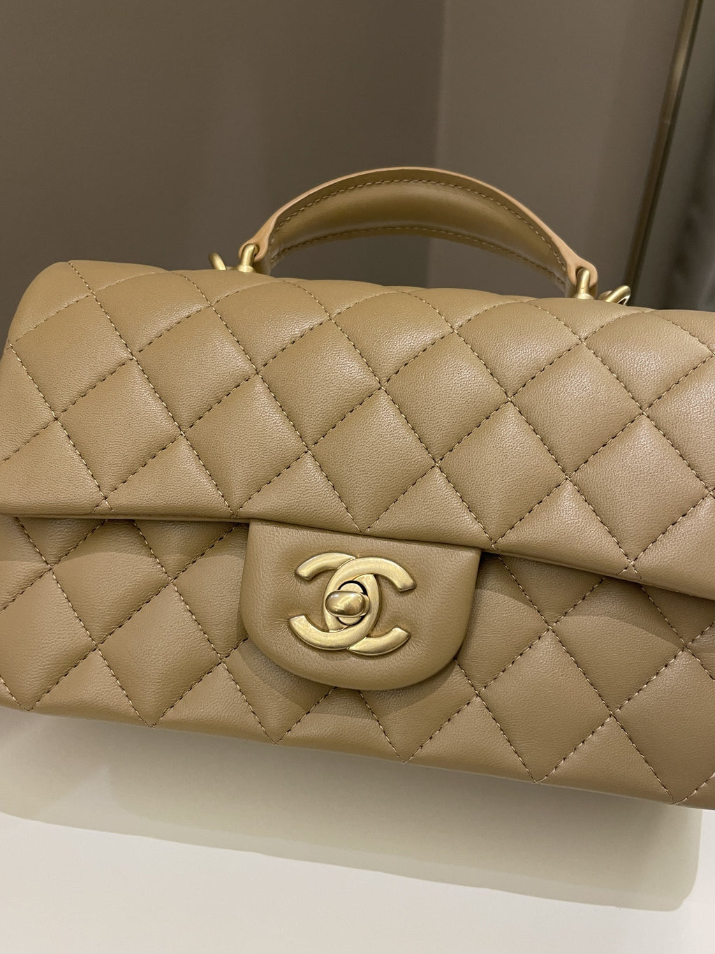 Chanel 22B Quilted Metal Top Handle Mini Rectangular Dark Beige Lambskin