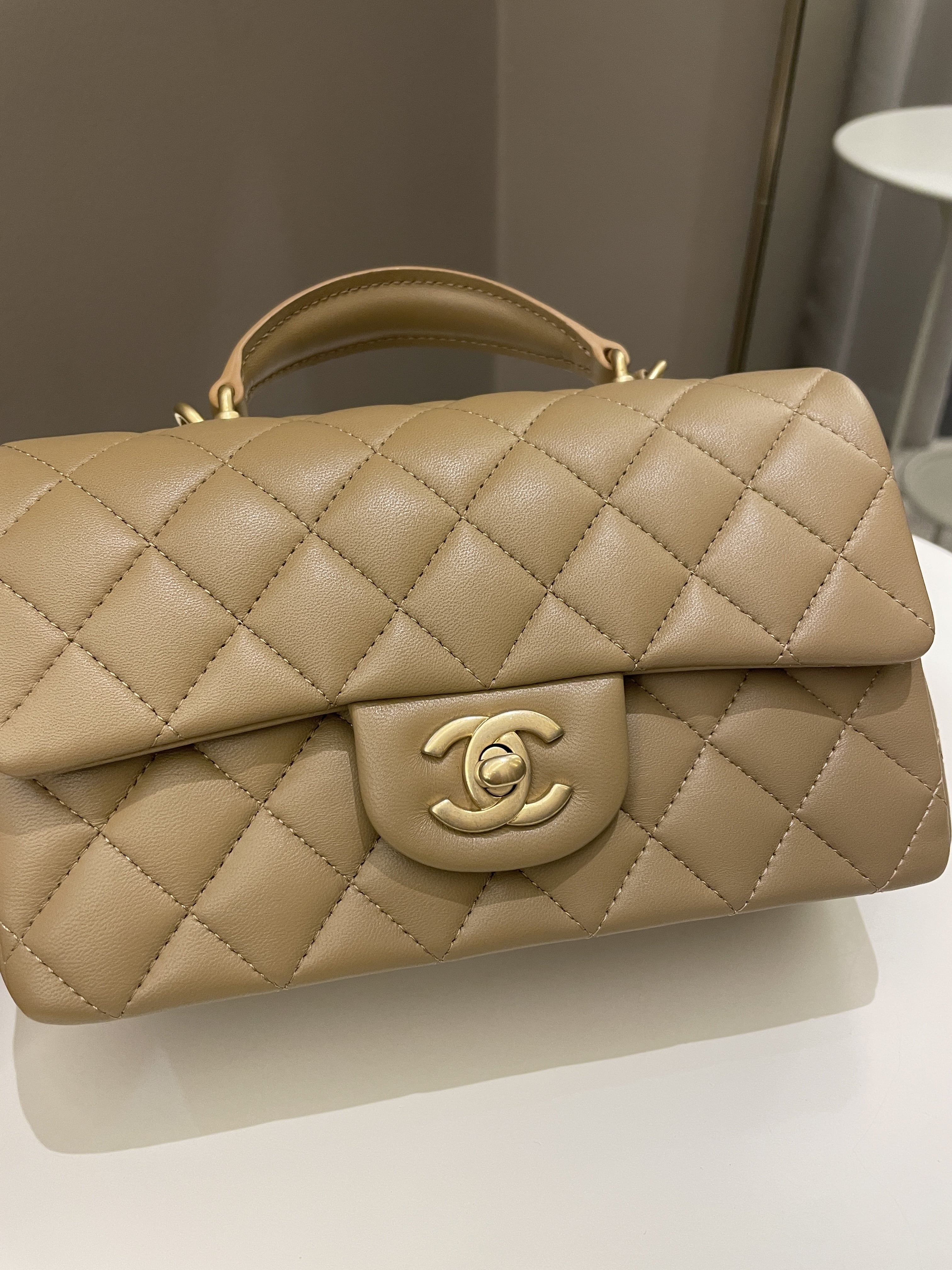 Chanel 22B Quilted Metal Top Handle Mini Rectangular Dark Beige Lambskin