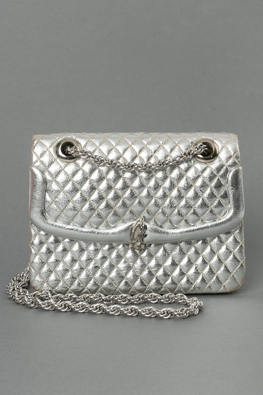 Petit sac en cuir matelassÃƒÆ’Ã‚Â© et mÃƒÆ’Ã‚Â©tal argentÃƒÆ’Ã‚Â©.