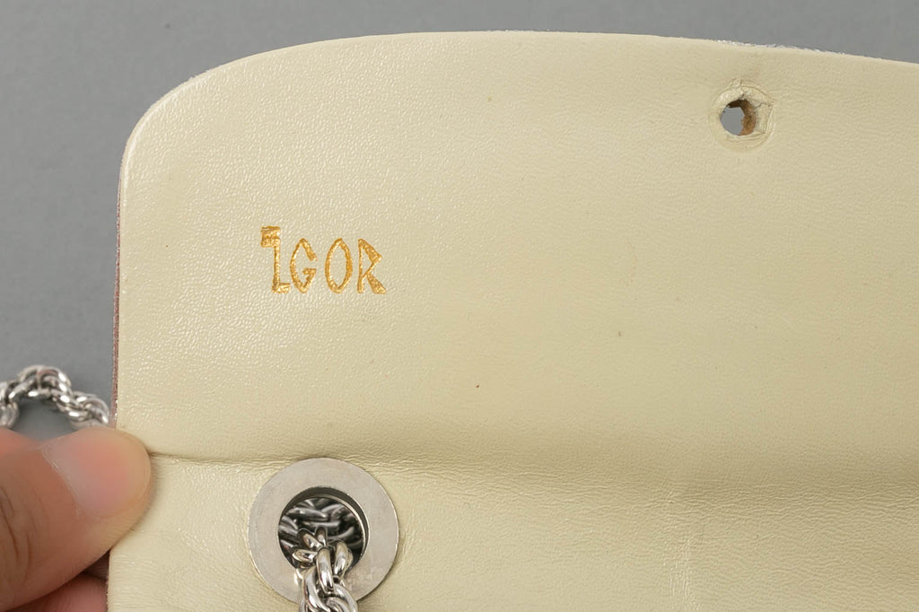Petit sac en cuir matelassÃƒÆ’Ã‚Â© et mÃƒÆ’Ã‚Â©tal argentÃƒÆ’Ã‚Â©.