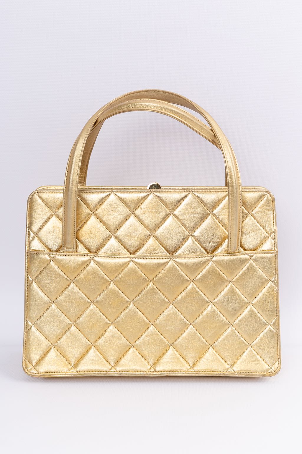 Sac du soir en cuir doré Chanel