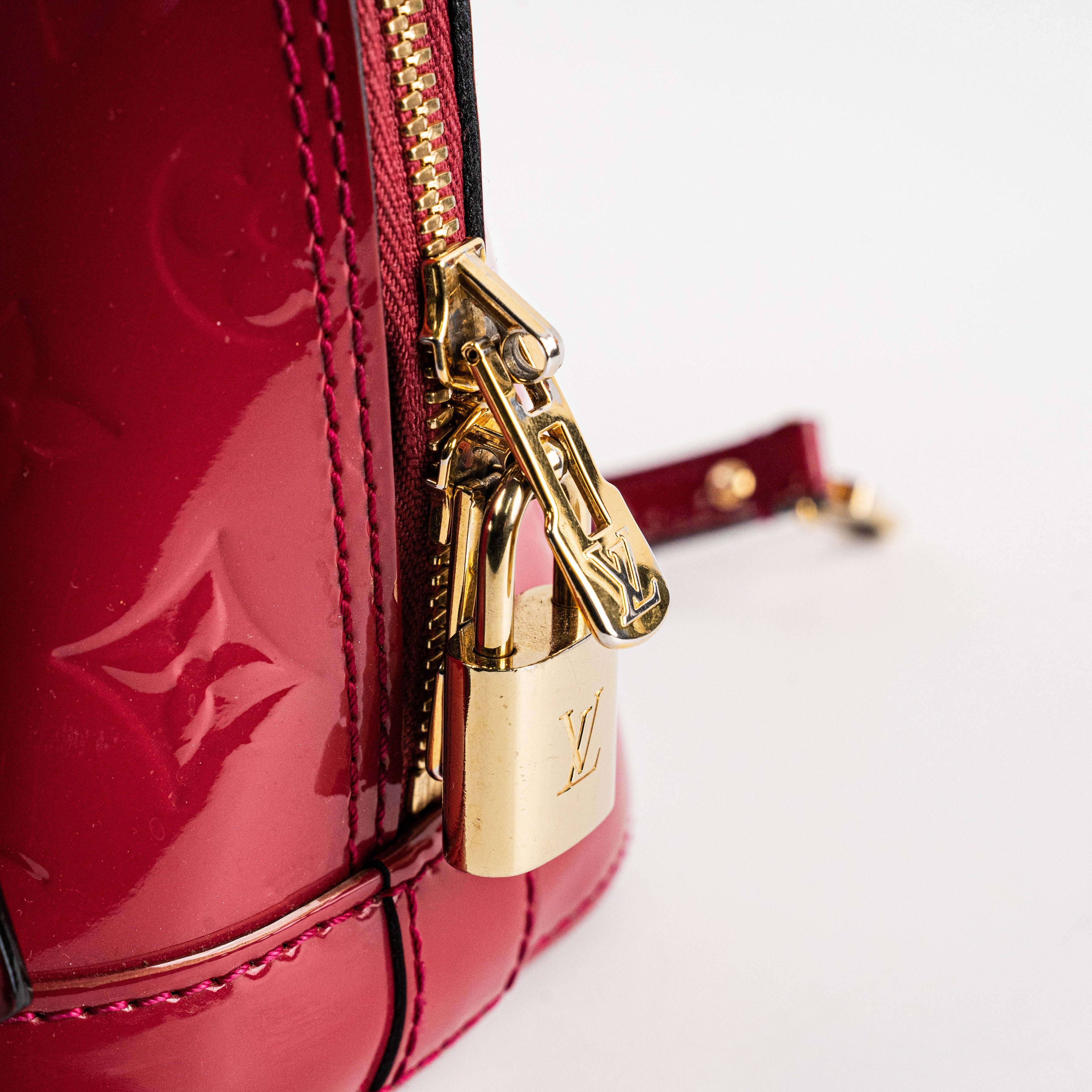 Louis Vuitton Alma BB Vernis Dark Pink Crossbody Bag
