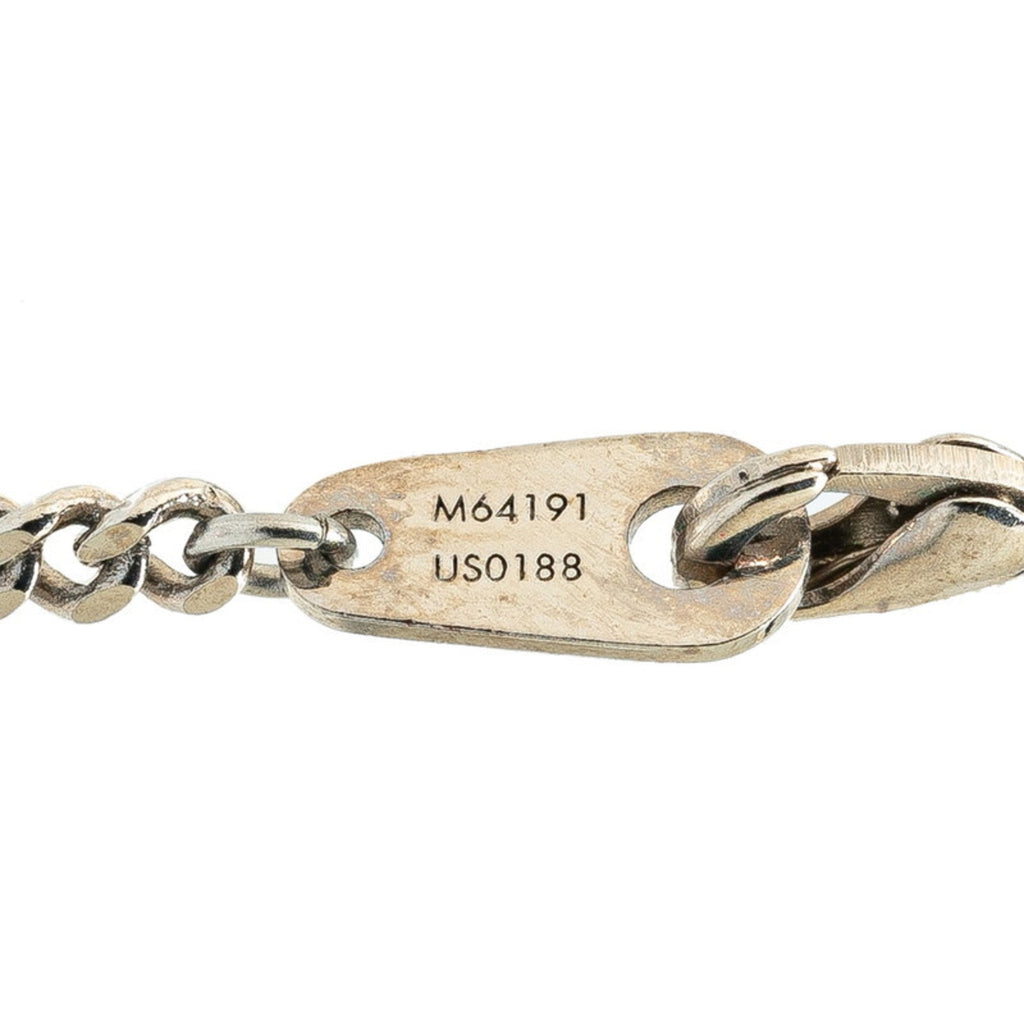 Luxury Metal Keychain with Subtle Scratches and Patina