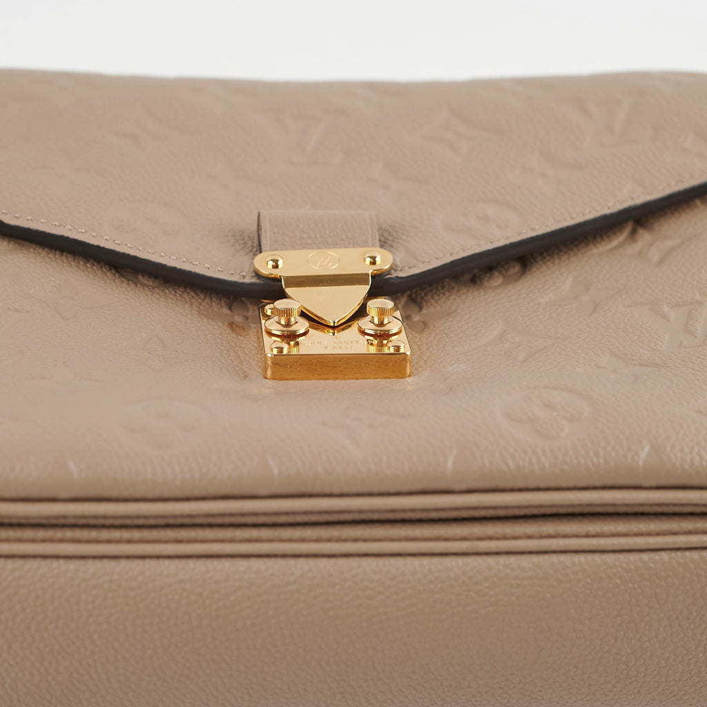 Louis Vuitton Pochette Metis Monogram Empreinte Leather Tourterelle Grey 2024