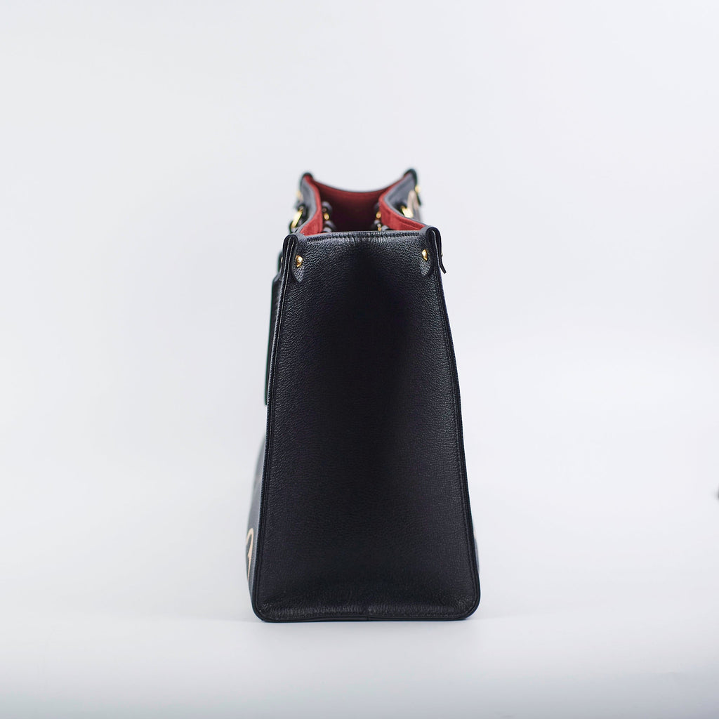 ITEM 18 - Louis Vuitton OnTheGo MM Bicolour