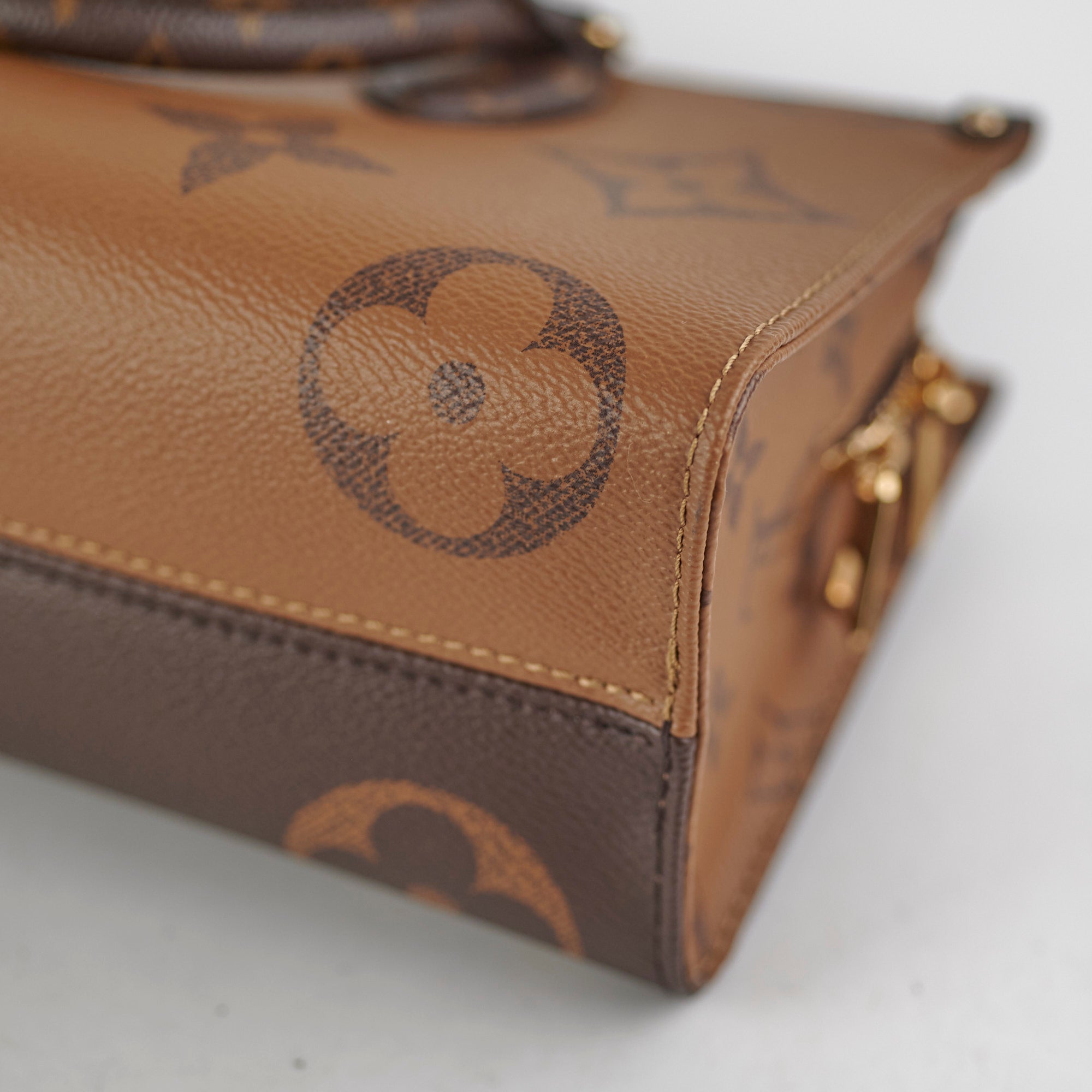 Louis Vuitton On the Go East West Reverse Monogram