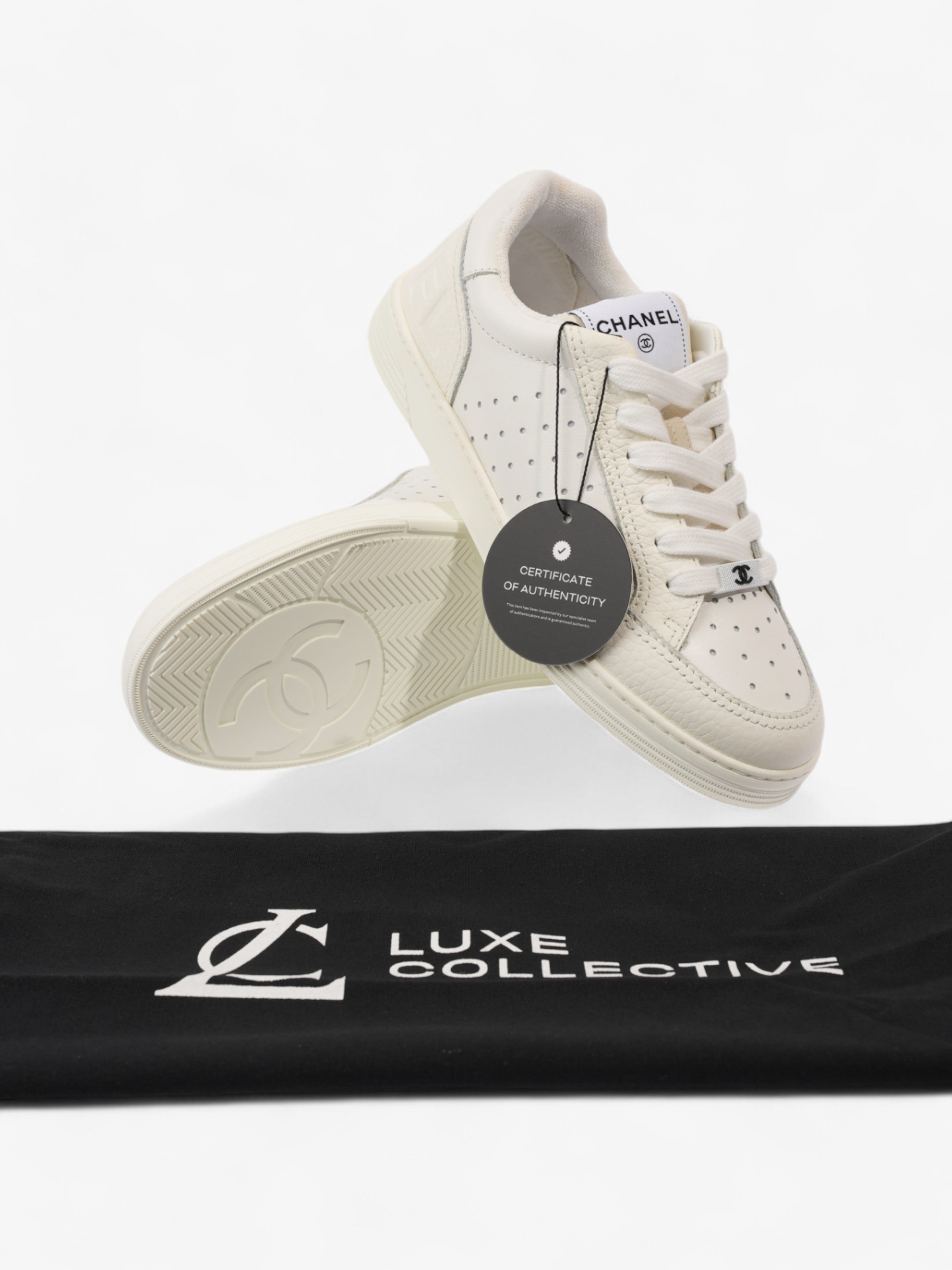 Chanel Perforated Low Top Sneakers White Leather EU 37 UK 4
