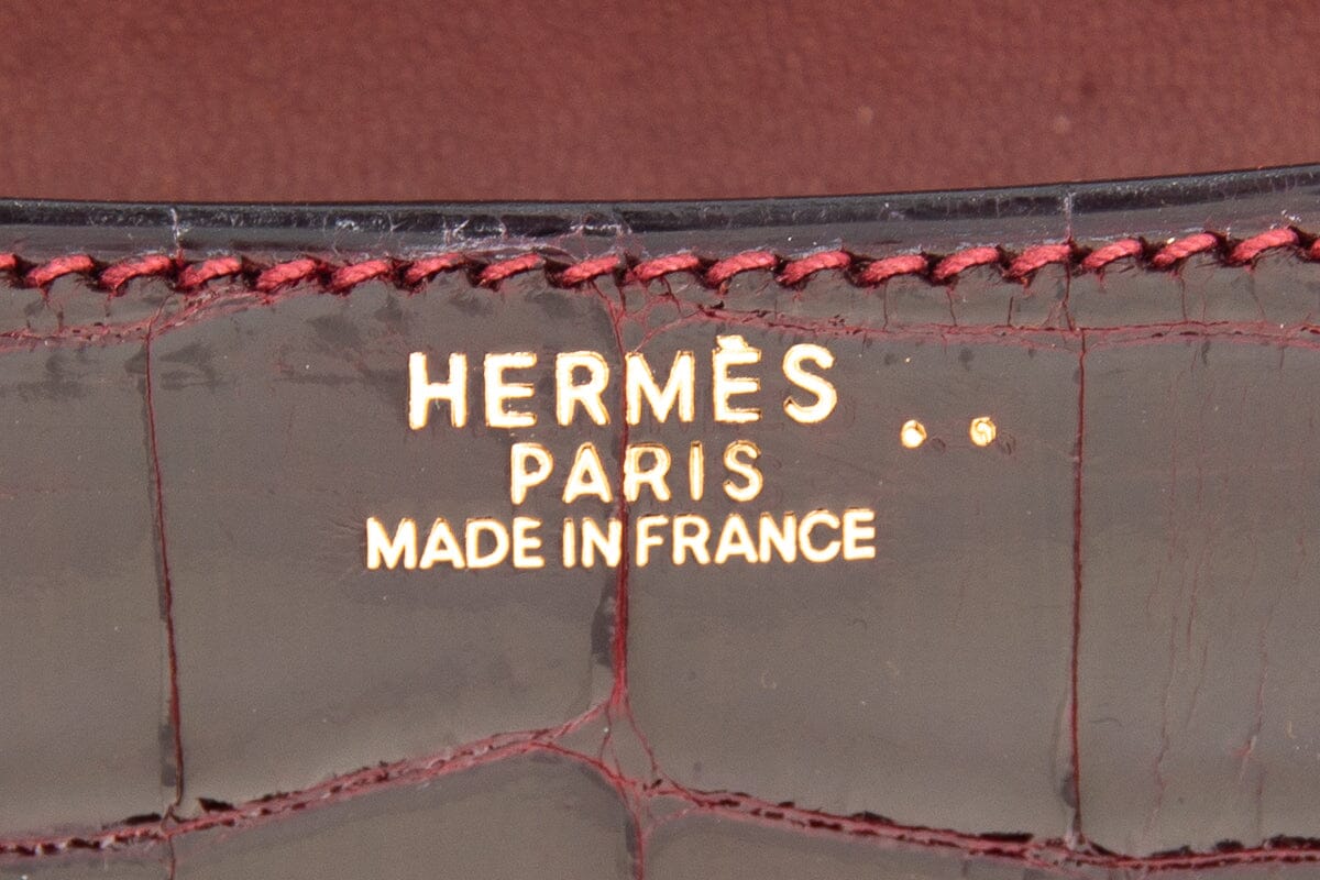 HermÃƒÆ’Ã‚Â¨s Shiny Niloticus Croc Constance 24 Bordeaux Handbag