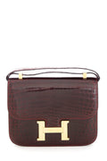 HermÃƒÆ’Ã‚Â¨s Shiny Niloticus Croc Constance 24 Bordeaux Handbag