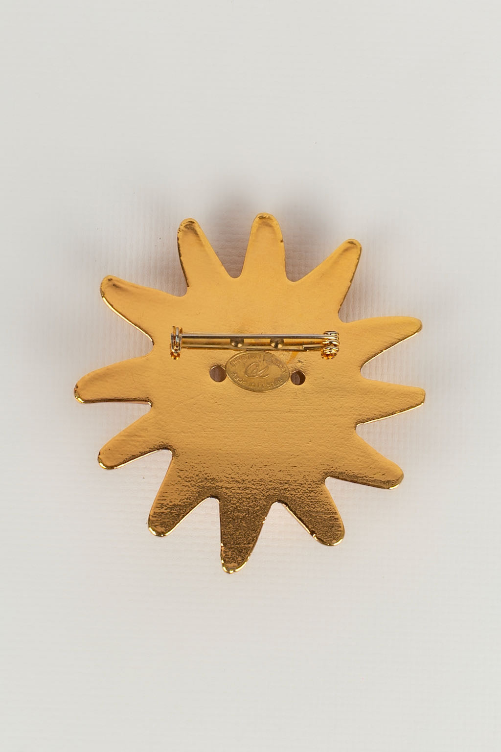 Broche soleil Christian Lacroix