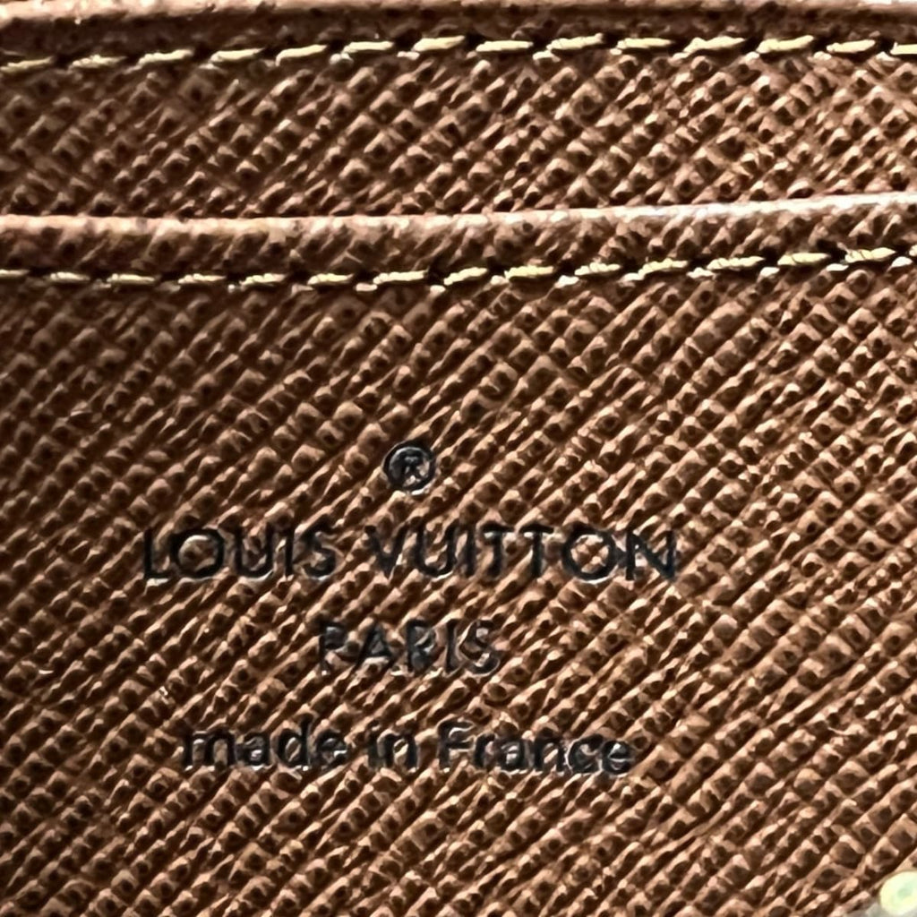 Louis Vuitton Zippy Coin Purse  Canvas Wallet  ()
