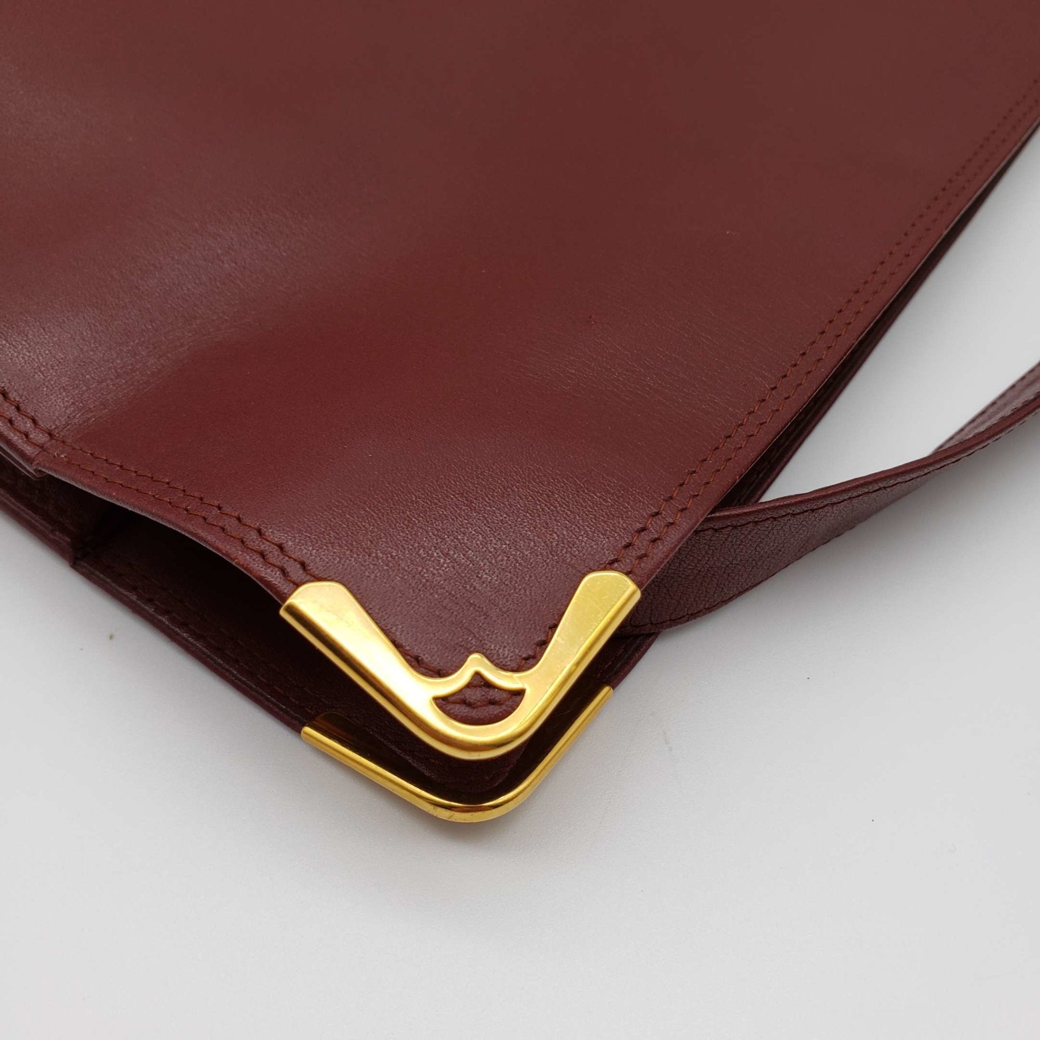 Cartier Gold Leather Clutch Bag