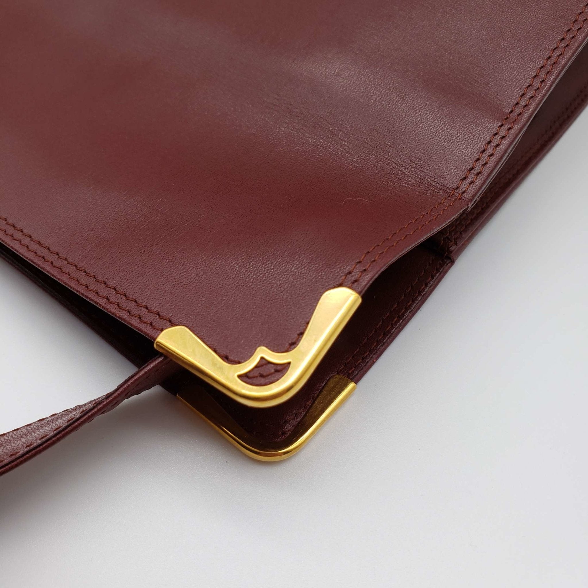 Cartier Gold Leather Clutch Bag