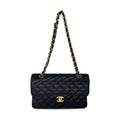 Pre owned Chanel small black caviar leather flap designer bag