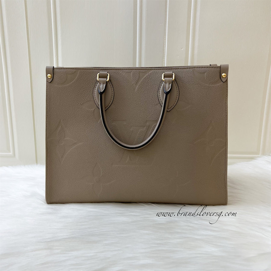 LV Onthego MM in Tourterelle Giant Monogram Empreinte Leather GHW