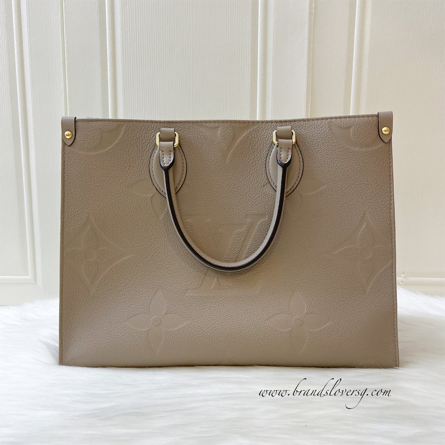 LV Onthego MM in Tourterelle Empreinte Leather and GHW