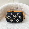 LV Mini Pochette Accessoires in Bicolor Black / Creme Empreinte Leather GHW