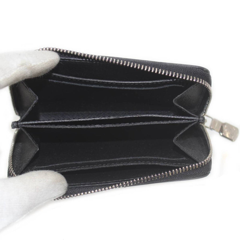 Louis Vuitton Porte Monnaie Zippy  Leather Wallet  ()