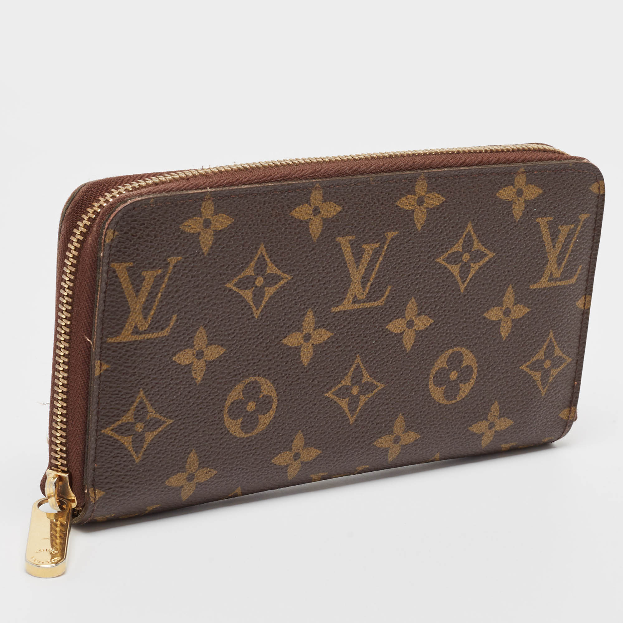 Louis Vuitton Monogram Canvas Zippy Wallet..