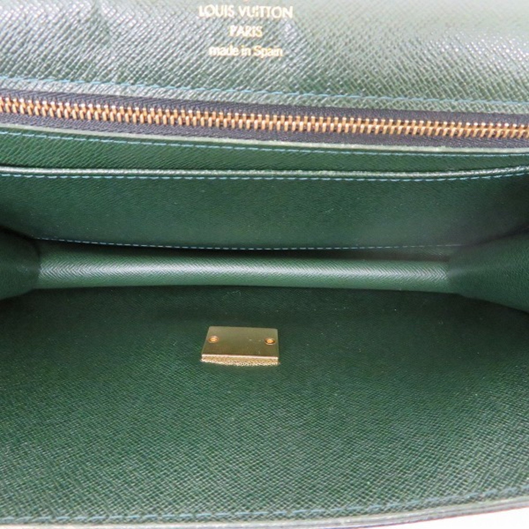Louis Vuitton Selenga  Leather Clutch Bag ()