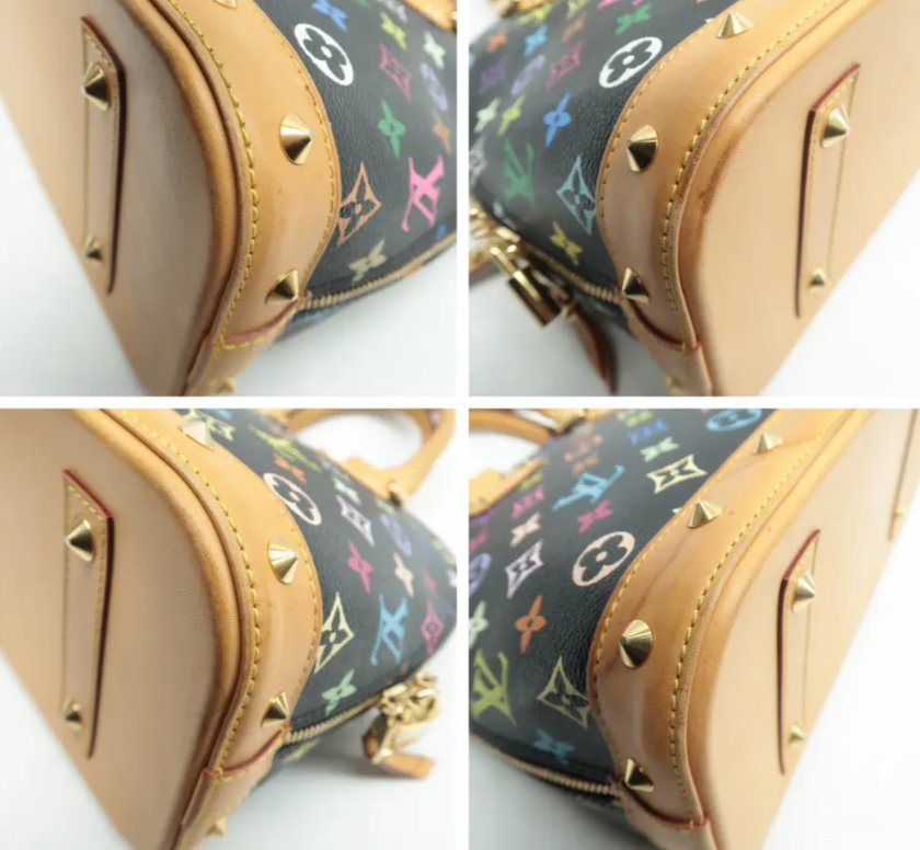 Louis Vuitton Alma Black Canvas Hand Bag