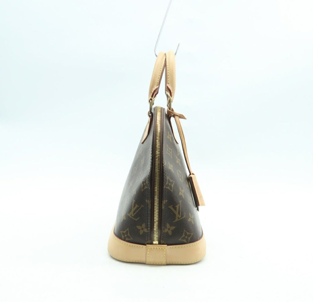 Louis Vuitton Alma Canvas Hand Bag