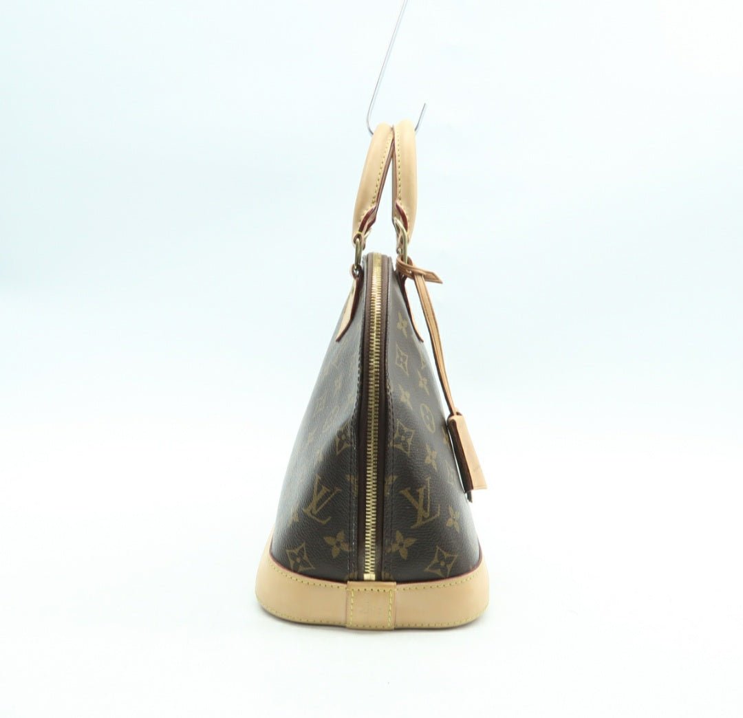 Louis Vuitton Alma Canvas Hand Bag