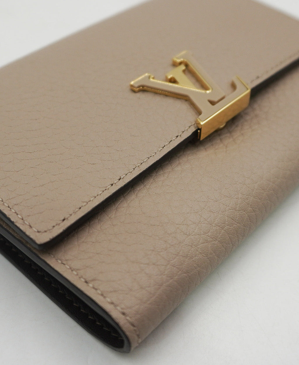 Capucines Compact Wallet in Taurillon Leather Cream