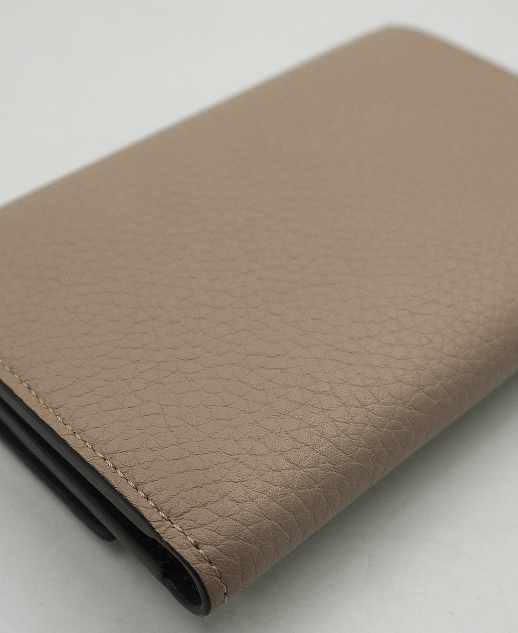 Capucines Compact Wallet in Taurillon Leather Cream
