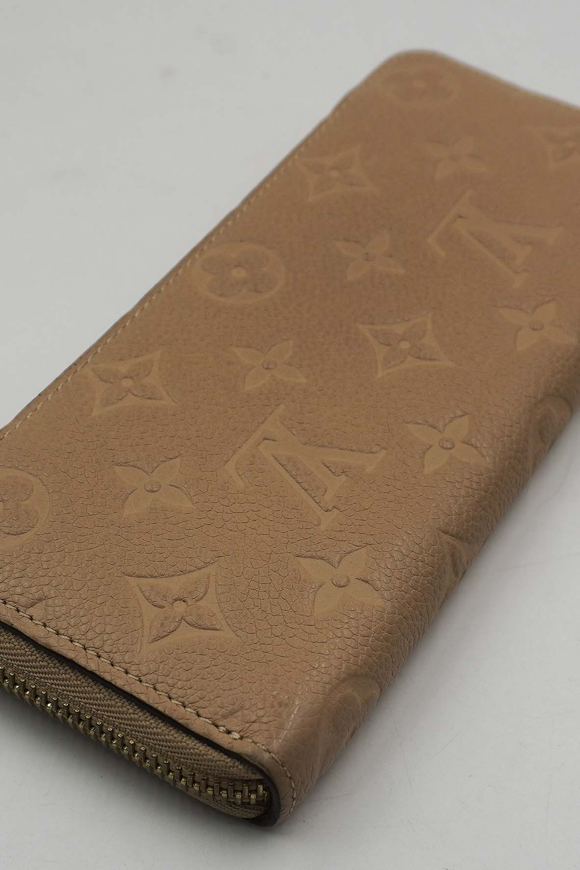 Monogram Empreinte Embossed Zippy Wallet Turtledove