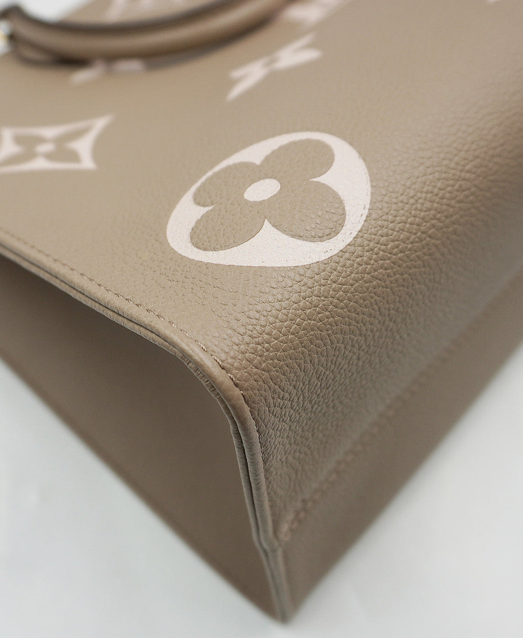Monogram Onthego MM Bicolor Empreinte Leather Beige