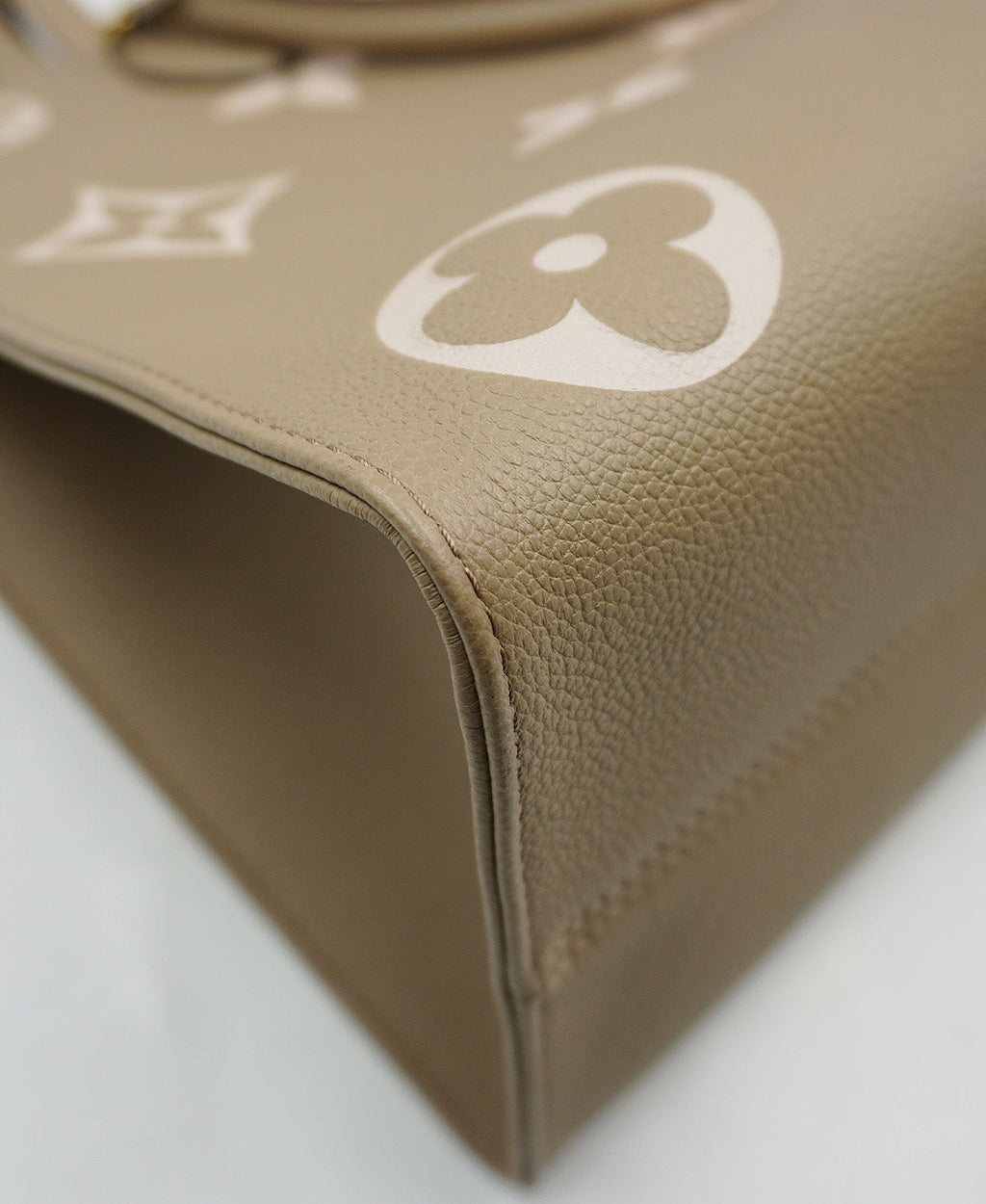 Monogram Onthego MM Bicolor Empreinte Leather Beige
