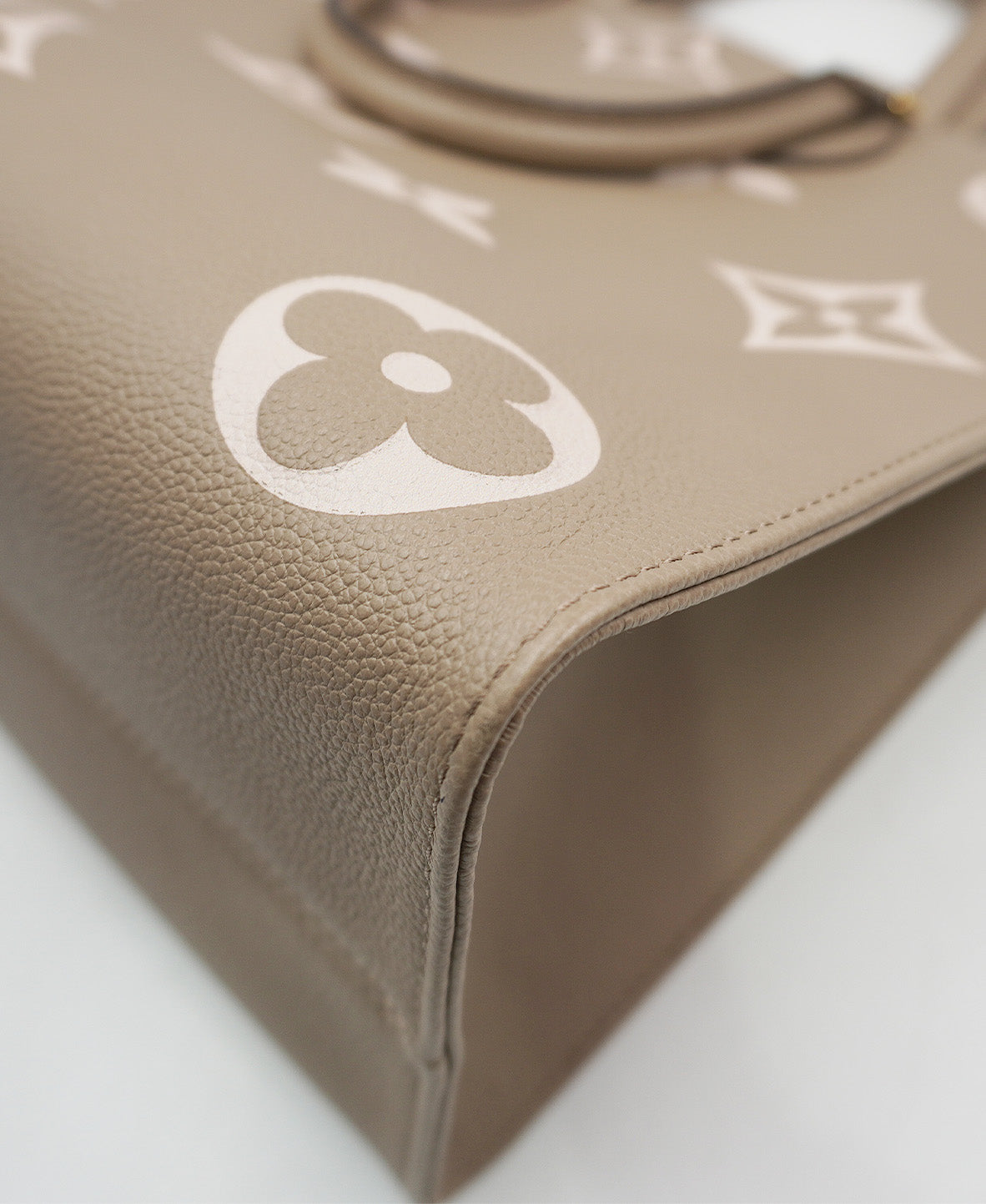 Monogram Onthego MM Bicolor Empreinte Leather Beige
