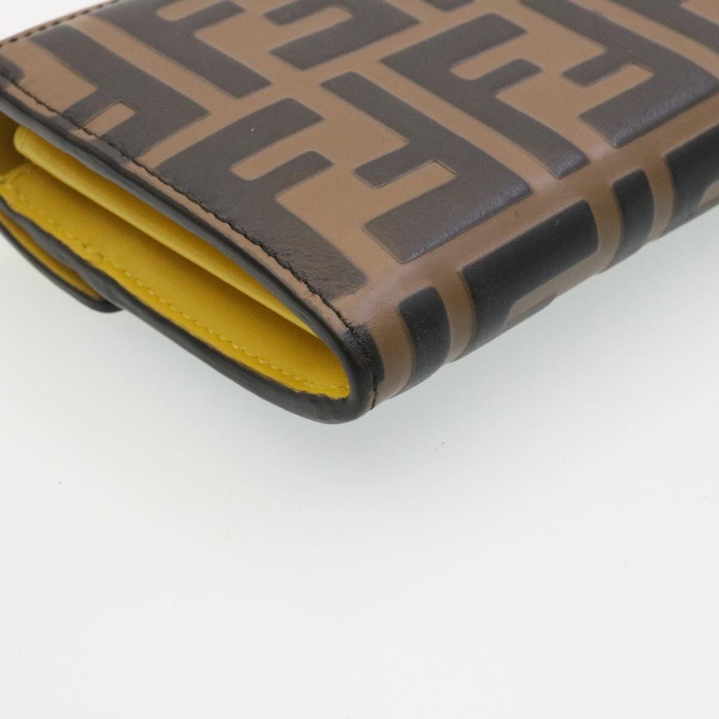 FENDI Zucca F is Continental Wallet Embossed Leather Yellow Brown 34531