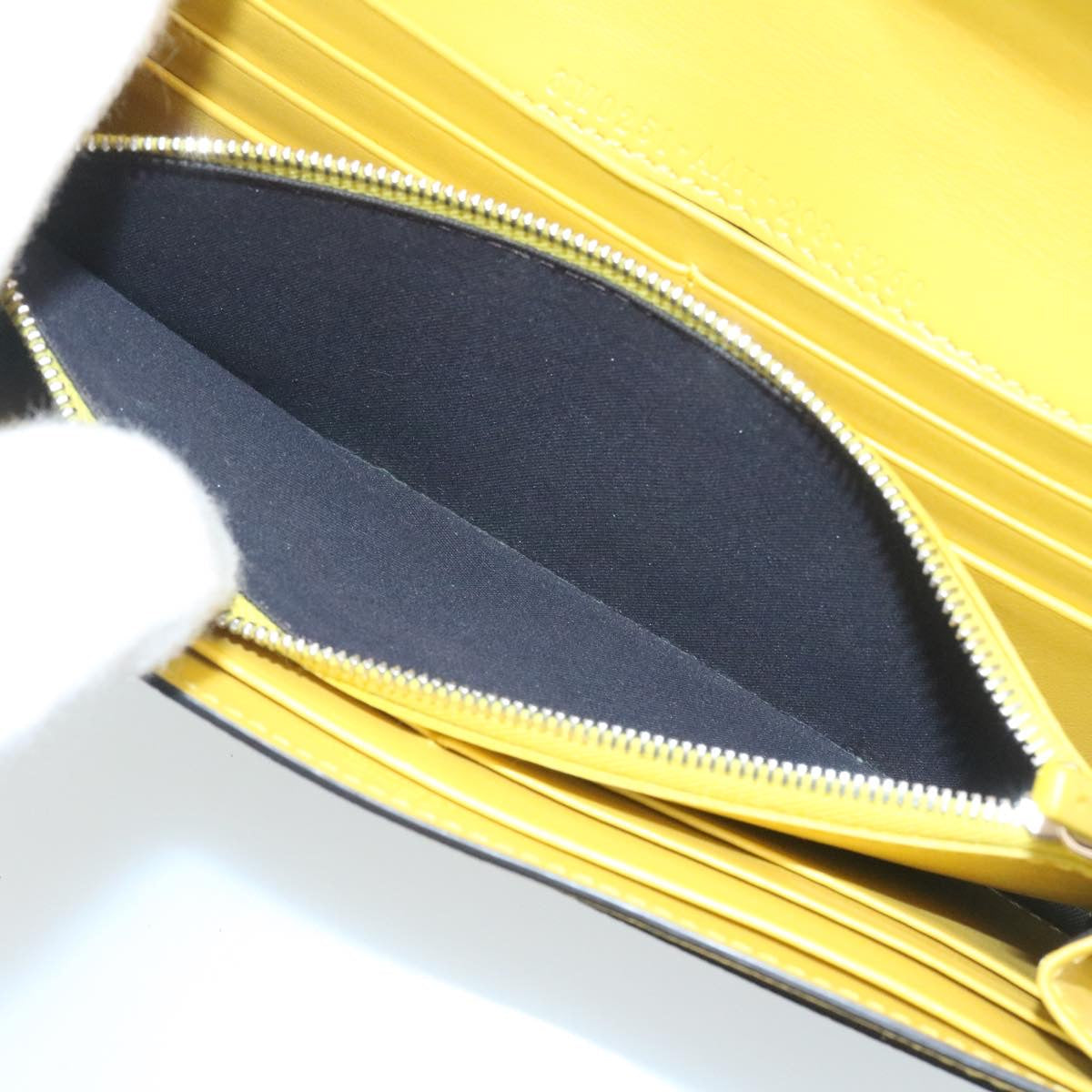 FENDI Zucca F is Continental Wallet Embossed Leather Yellow Brown 34531