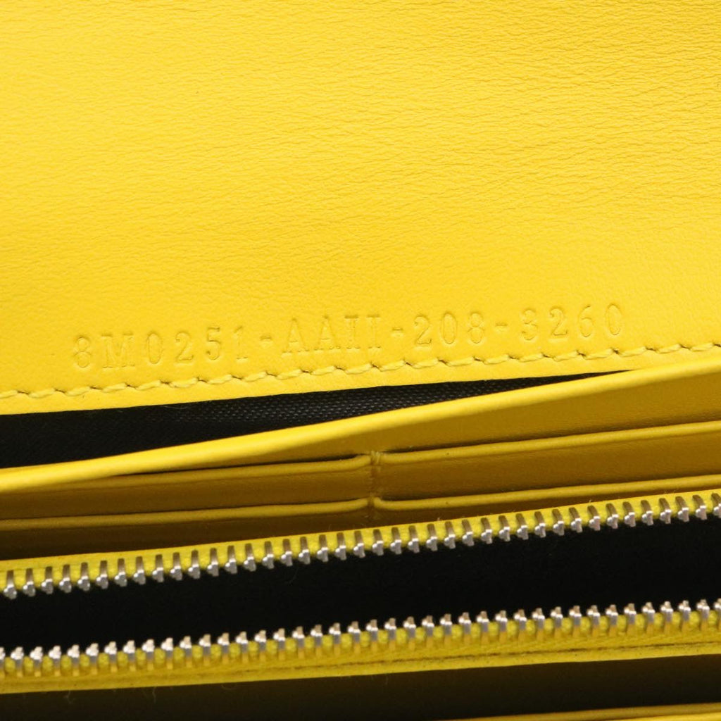 FENDI Zucca F is Continental Wallet Embossed Leather Yellow Brown 34531