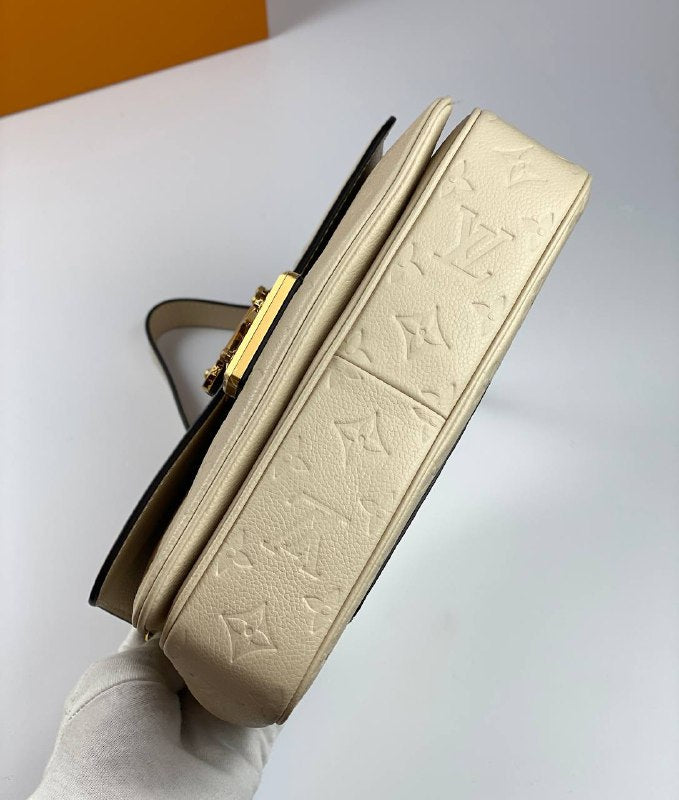 Louis Vuitton Marceau Bag creme