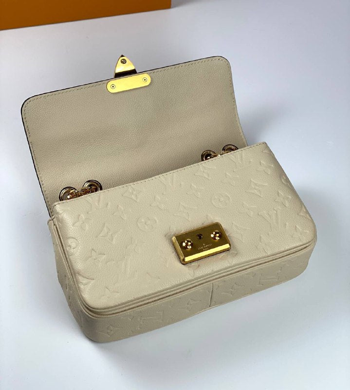 Louis Vuitton Marceau Bag creme