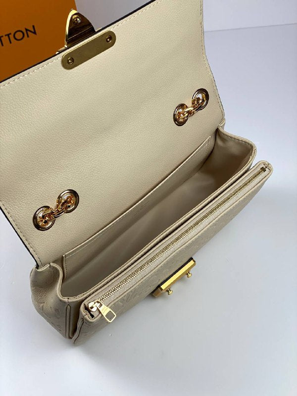 Louis Vuitton Marceau Bag creme