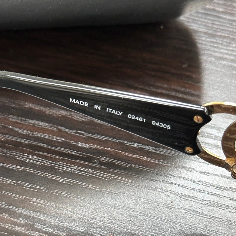 Pre-loved Chanel F Black Sunglasses