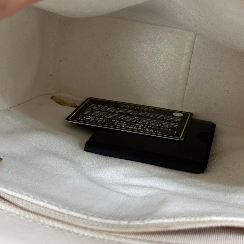 Pre-loved Chanel Coco Tote in Beige Patent Leather