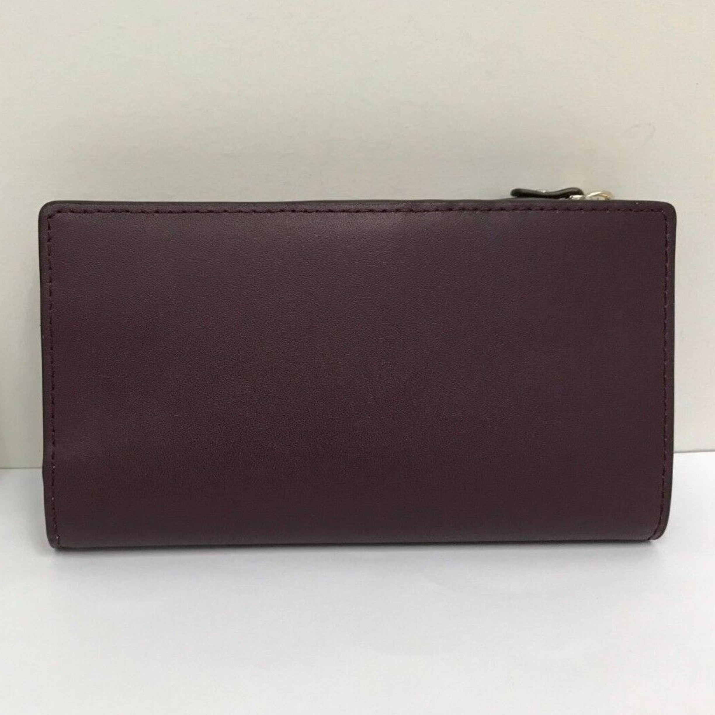 KATE SPADE NEW YORK Deep Purple Plum Putnam Drive Small Nelle Leather Tote Bag and Deep Plum Purple Braylon Putnam Drive Wallet
