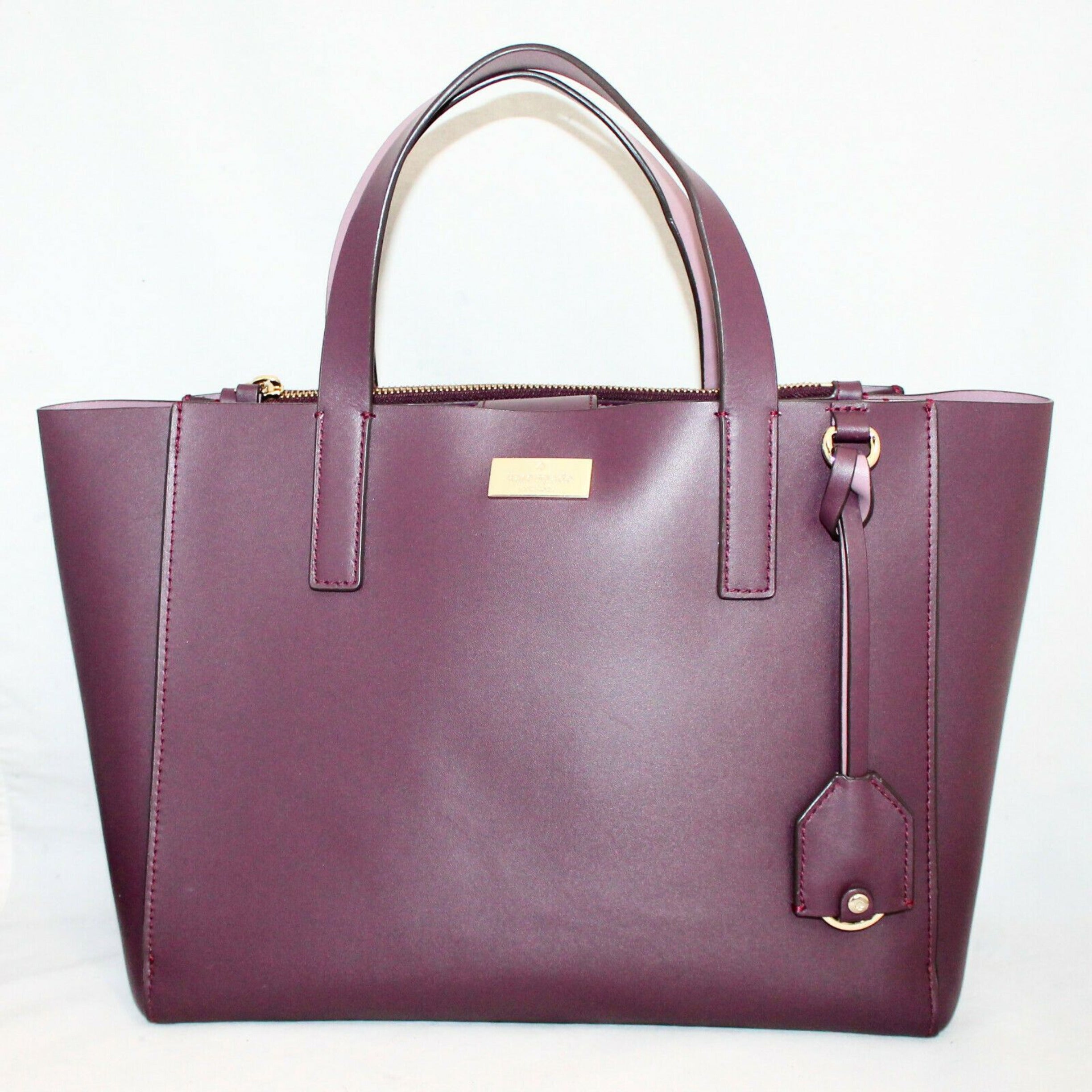 KATE SPADE NEW YORK Deep Purple Plum Putnam Drive Small Nelle Leather Tote Bag and Deep Plum Purple Braylon Putnam Drive Wallet