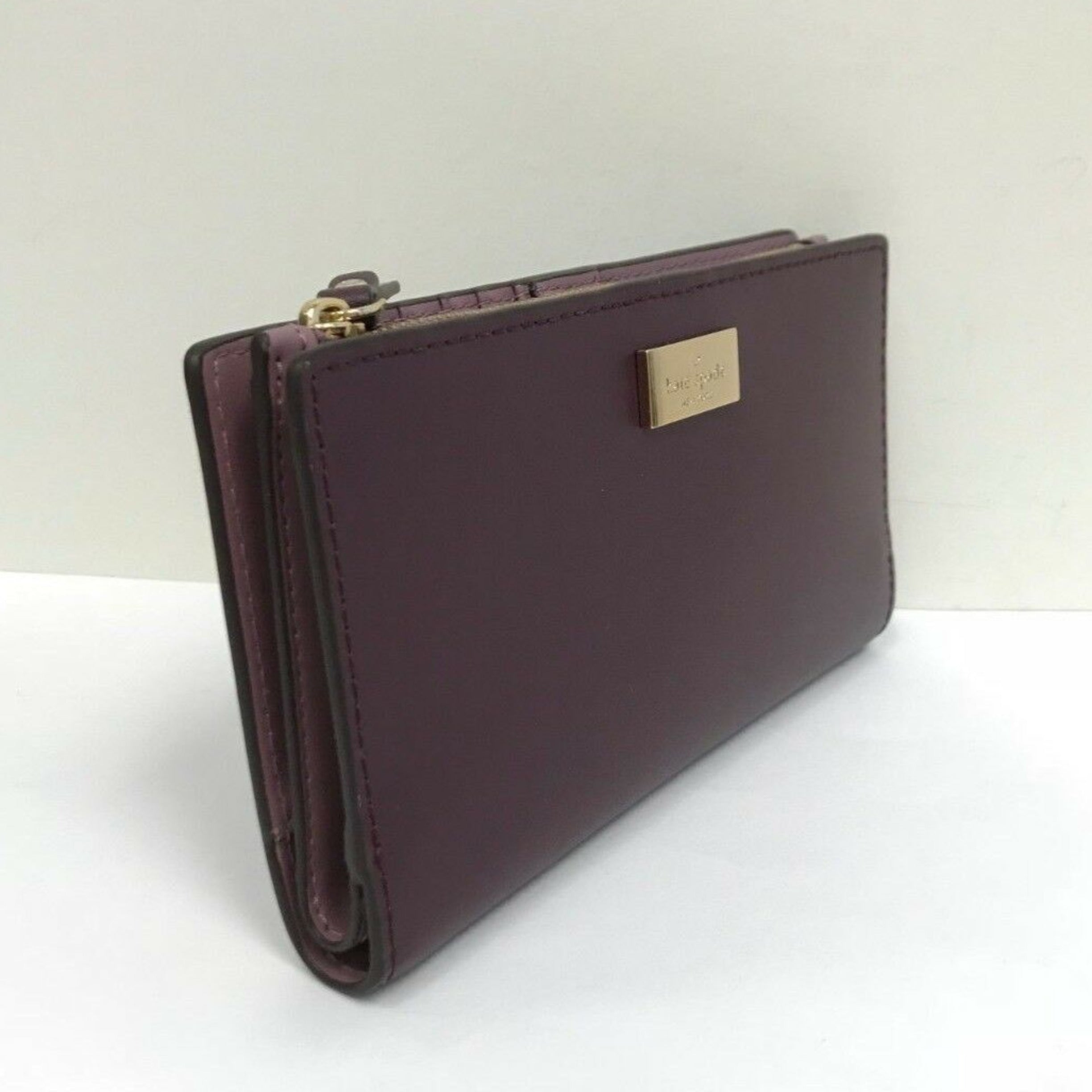 KATE SPADE NEW YORK Deep Purple Plum Putnam Drive Small Nelle Leather Tote Bag and Deep Plum Purple Braylon Putnam Drive Wallet