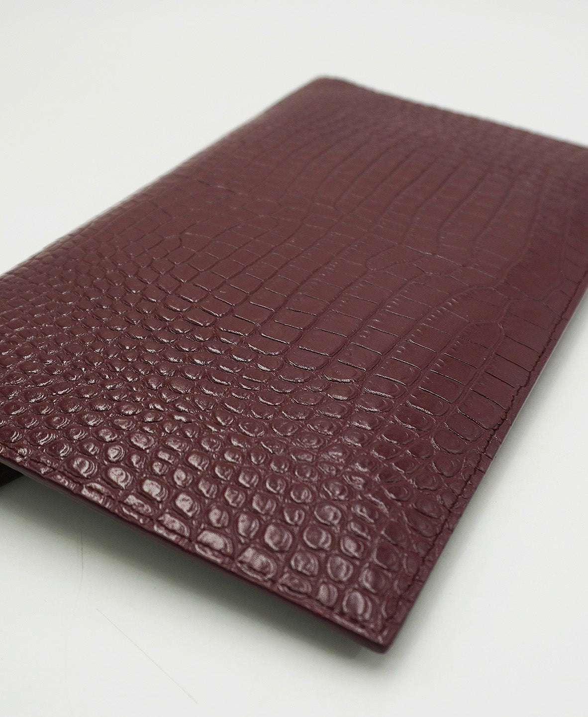 Embossed Monogram Uptown Envelope Pouch Red