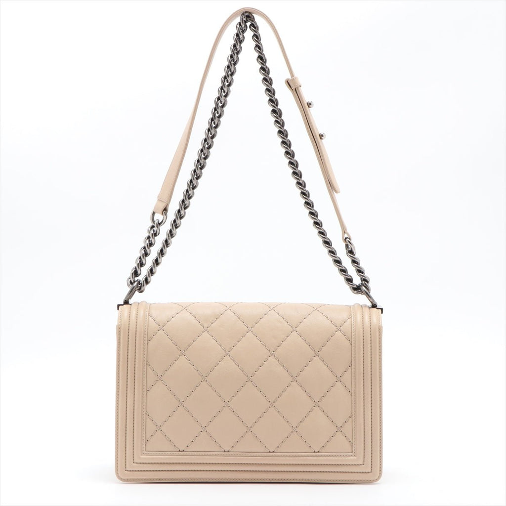 Boy in Beige Leather Ruthenium