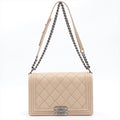 Boy in Beige Leather Ruthenium