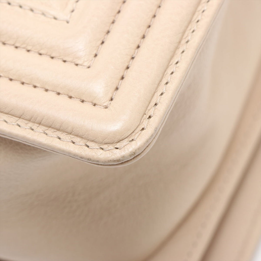 Boy in Beige Leather Ruthenium